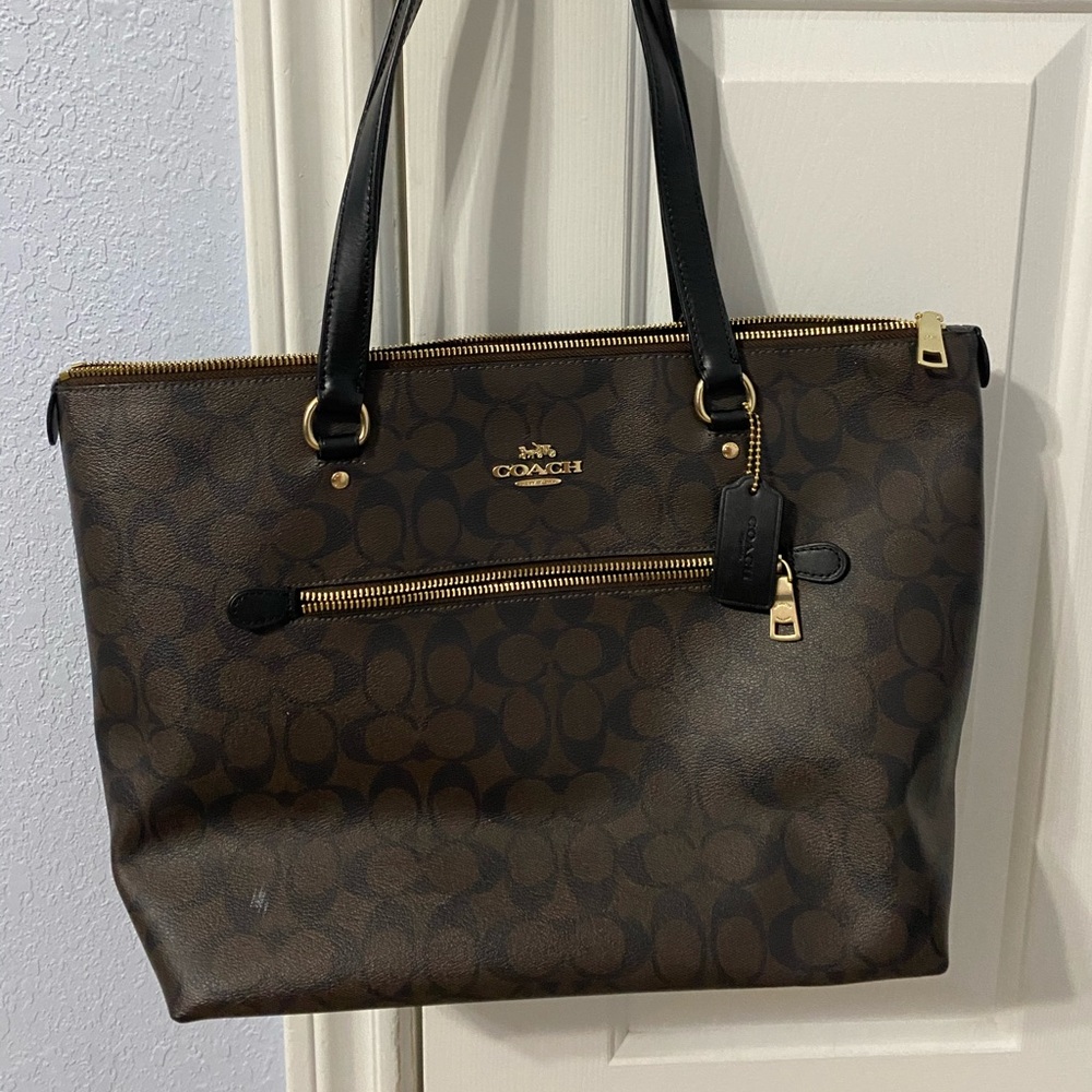 Black and Brown Signature Coach Handbag